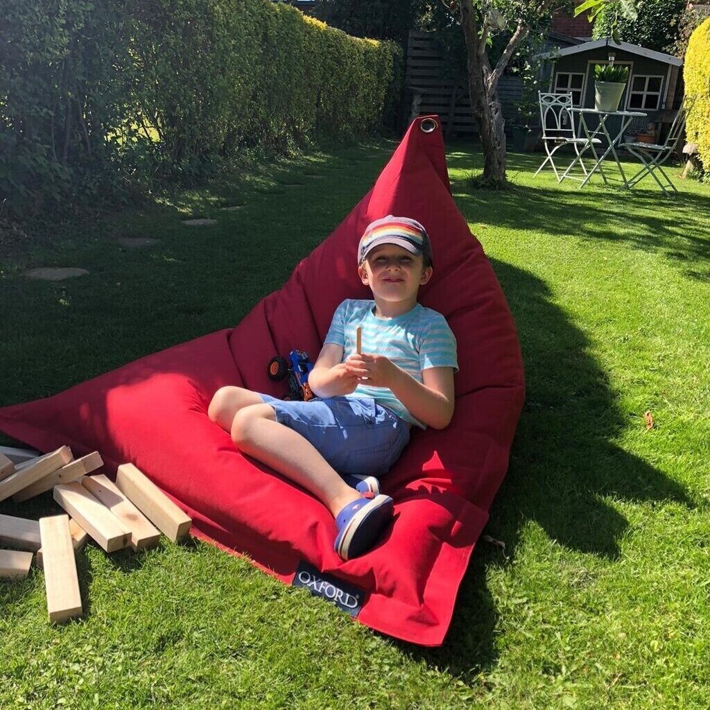 Red MOSA beanbag in garden